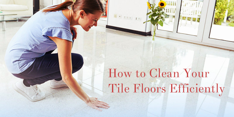 woman in blue top touching tile floor