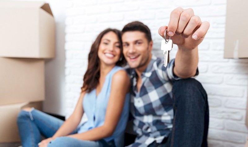 young couple planning to relocate their house