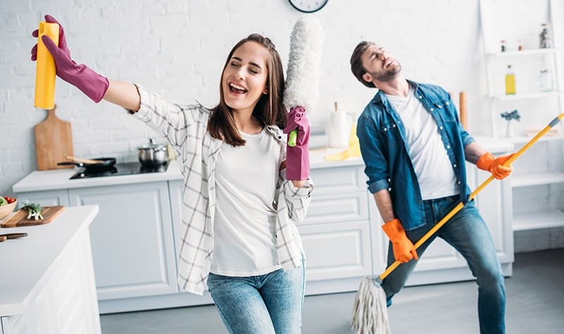 Young couple enjoying while sprucing up their house