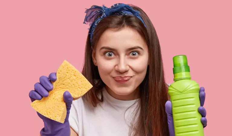 young woman with a cleaning chemical bottle and a cleaning mop