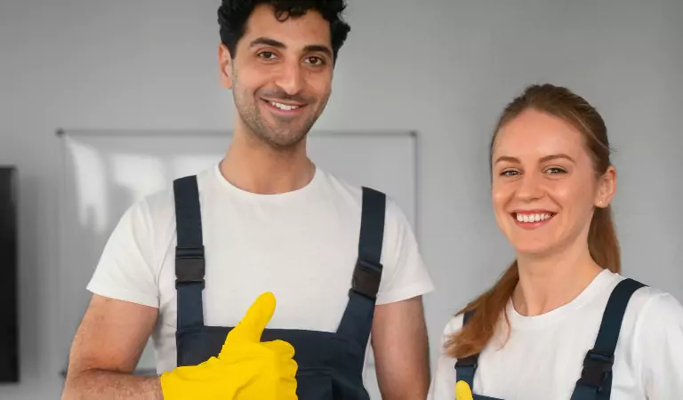 young professional cleaners looking ready to clean their house