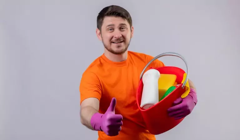 young man looking ready to clean his house