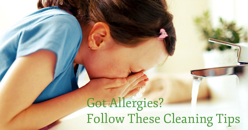 young girl with allergies sneezing and washing hands