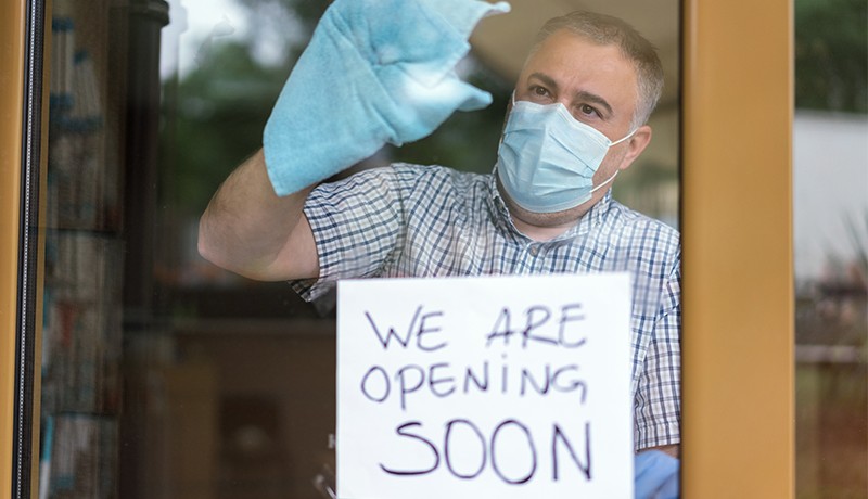 An Old man preparing to reopen his business after COVID-19 lockdown