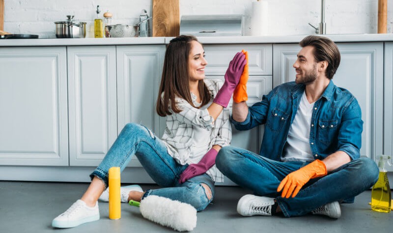 young couple is getting prepared for sprucing up their house